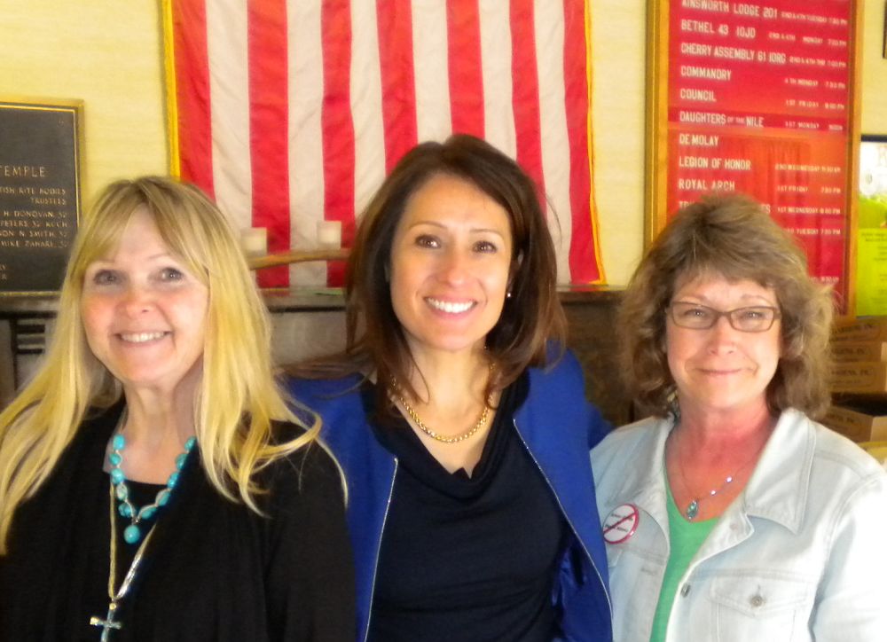 Maria Espinosa, co-founder of The Remembrance Project (center), Katherine Stone (left) and Cynthia Kendoll (right)