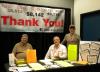 Volunteers in the booth at the Dorchester Conference